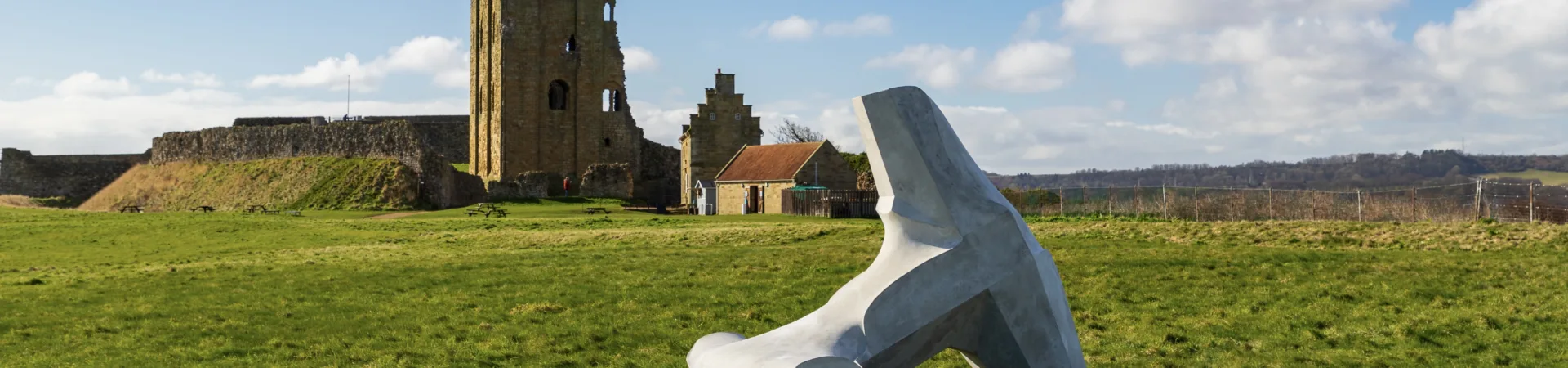 Ryan Gander’s concrete sculpture in the shape of a dolos, titled We are only human, stands on the grass area in front of Scarborough Castle