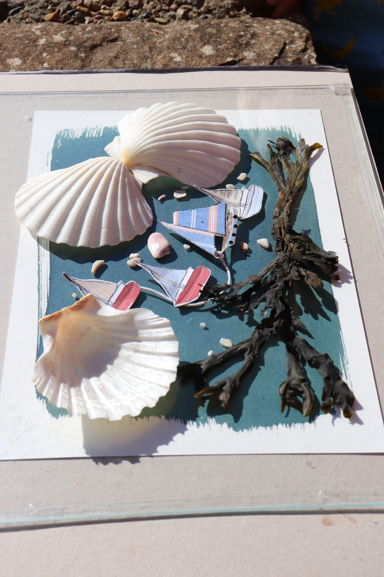 Juneau Projects creative workshops in progress with participants using seaside items including shells and seaweed